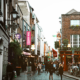 Streets with people in a city with buildings