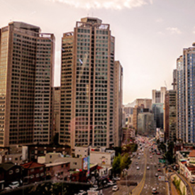 City with skyscrapers and roads full of traffic